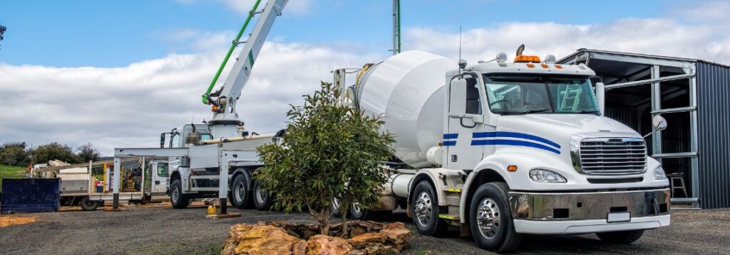 Ready mix concrete delivery by truck in construction site